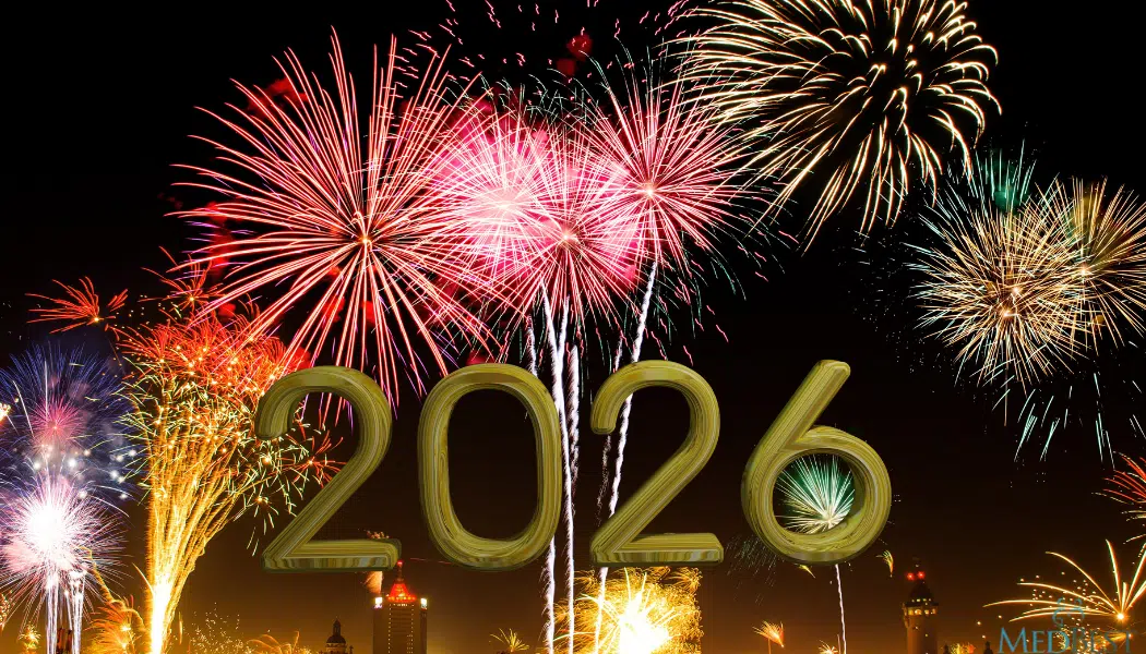 Firecrackers in sky behind the year 2026