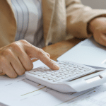 Women Senior Living Executive Calculating the Cost of a Vacant Position