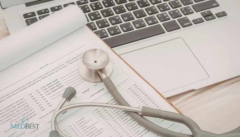 stethoscope on top of chart and laptop in senior living facility