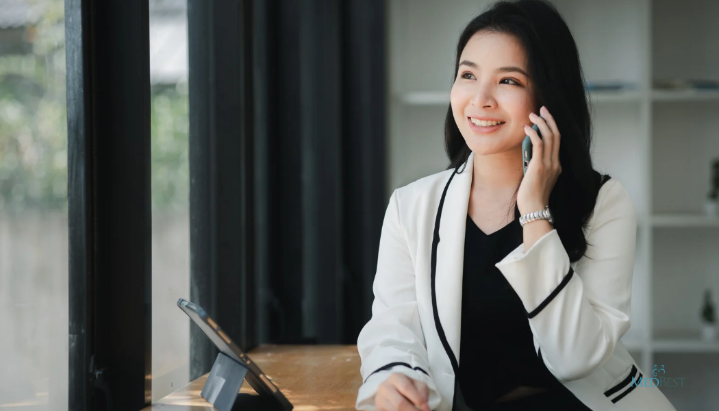 Woman Interim Executive on Her Cell in a Senior Care Community